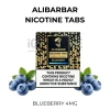 ALIBARBAR Blueberry Nicotine Tabs 4mg pack beside fresh blueberries
