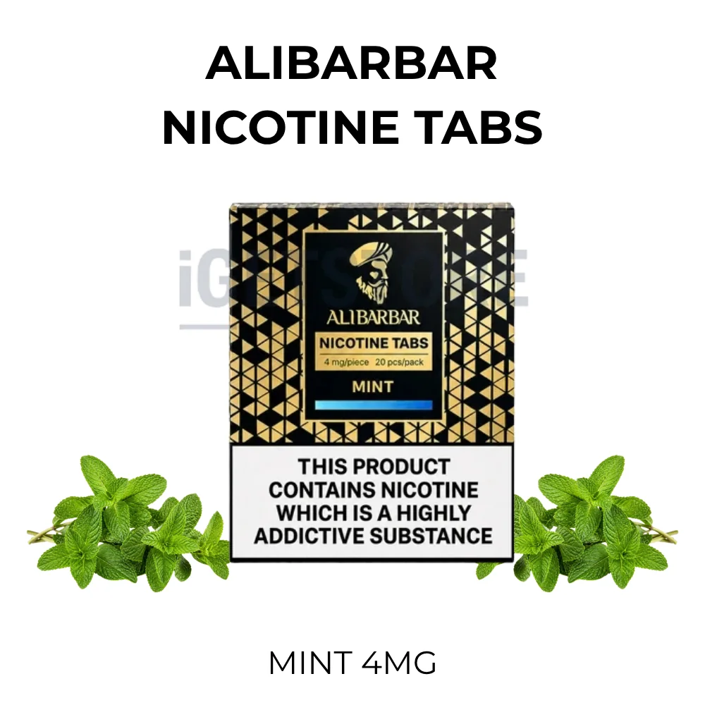 ALIBARBAR Mint Nicotine Tabs 4mg pack beside fresh mint leaves