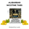 ALIBARBAR Pineapple Nicotine Tabs 4mg pack beside fresh pineapple chunks